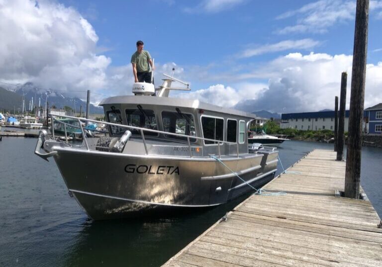Goleta at dock , putting up anteneas