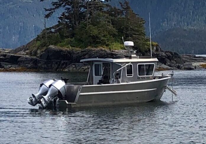 boat-on-anchor-in-front-of-small-island-1024x768